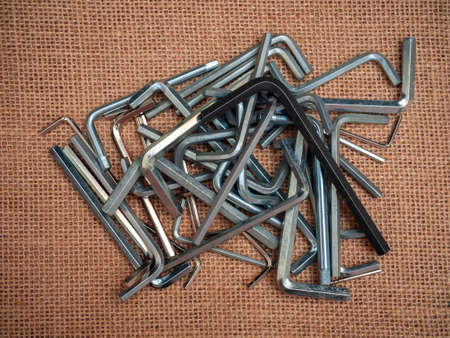Chaotic mess of hex keys. Heap of the iron instruments. Close-upの写真素材