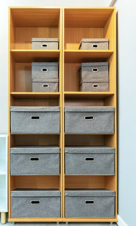 Open shelves with gray modular fabric storage boxes