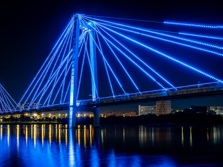 A bridge over a wide river with night illumination.の写真素材