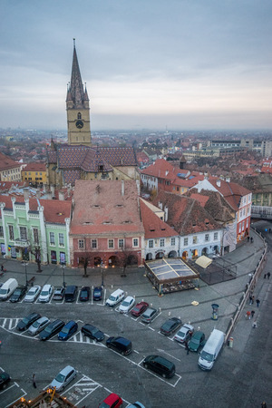Sibiu, Romania, 2017 - The Evangelical Church on Huet Square at sunset in Novermberのeditorial素材
