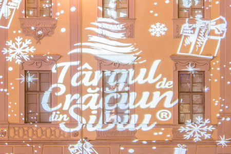 Logo of the 2017 Christmas market in Sibiu projected on a building, Transylvania, Romaniaの写真素材