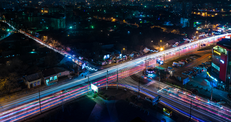 CHISINAU, MOLDOVA  DECEMBER 21, 2015: Chisinau, capital of Moldova, view from above at night with light trails.のeditorial素材