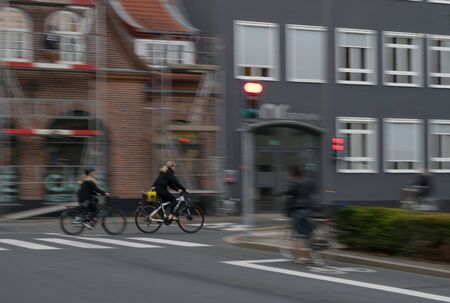 VIBORG, DENMARK -  SEPTEMBER 21, 2016: Unidentified people riding on bicycles in Viborg,  capital of...