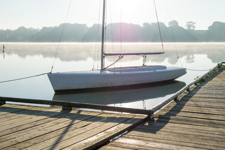 A boat at sunrise in Denmarkの写真素材
