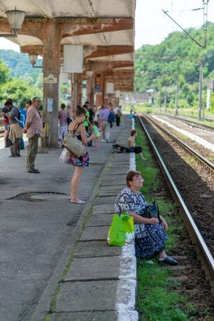 SIGHISOARA, ROMANIA - 1 JULY 2016: People waiting for the train in Sighisoara, Romaniaのeditorial素材