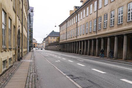 Copenhagen - October 23, 2016: A view to a gallery passing and some cyclers