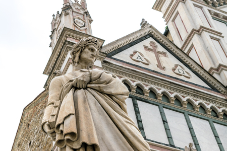 The Statue of Dante Alighieri located in Piazza Santa Croce, next to Basilica of Santa Croce, Florence, Italy. It was built in 1865 by Italian sculptor Enrico Pazzi.のeditorial素材