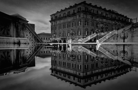 Beautiful and dramatic architectural reflection in Bologna, Italyの写真素材