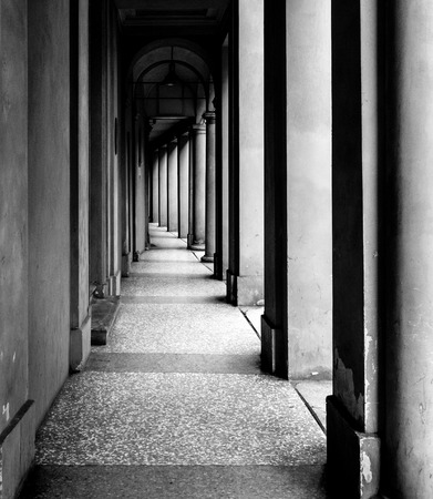 Portico, sheltered walkway, in Bologna with its almost 40 kilometres of porticos. Bologna is a unique city in the world.の写真素材