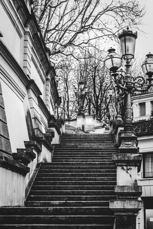 Old street lamps and stairs in Bologna, Italy.のeditorial素材