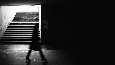 Woman walking in a underground passing.の写真素材