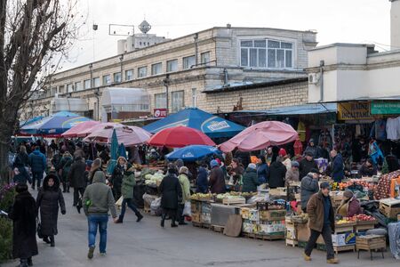 CHISINAU, MOLDOVA - 28 DECEMBER, 2016: People at the central food market in Chisinau, Moldova.のeditorial素材