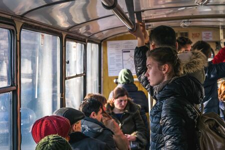 CHISINAU, MOLDOVA -11 FEBRUARY, 2016: People standing in the trolley bus.