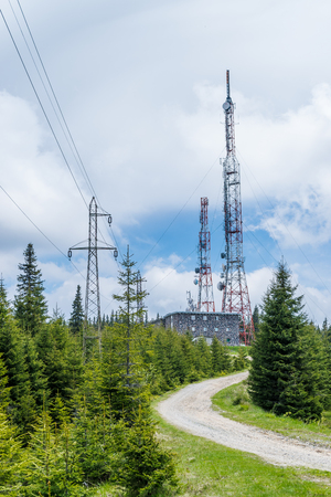 Telecommunication tower in the forest on top of a mountain.の写真素材