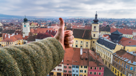 Sibiu Council Tower and Holy Trinity Roman Catholic Church viewed from the Evangelical Church.の写真素材