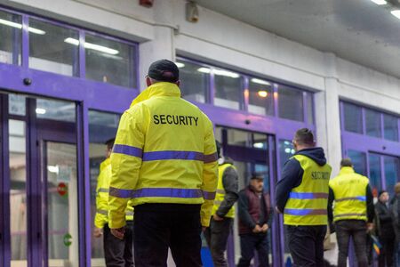SIBIU, ROMANIA - 1 DECEMBER, 2017: Security check at the entrance of a building.