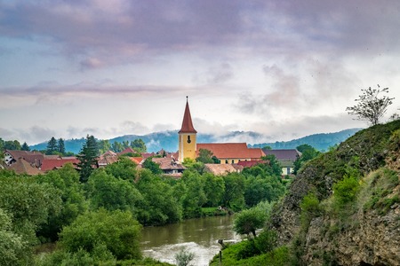 A church in a small village in Transylvania region, Romania.の写真素材
