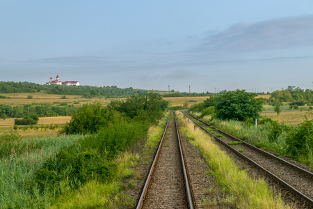 Railway tracks in Romania on a summer day.の写真素材