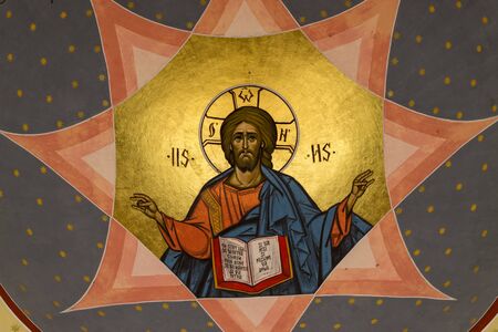 SIBIU, ROMANIA - July 17, 2018: Jesus Christ on the Orthodox Church of Ascension and St. Nicholas in Sibiu, Romania.のeditorial素材