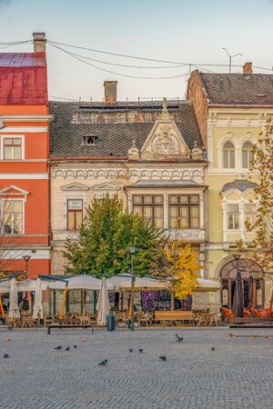 CLUJ-NAPOCA, ROMANIA - October 13, 2018: Cluj-Napoca city center. View from the Unirii Square to the Wass Palace at sunrise on a beautiful, clear sky day.のeditorial素材