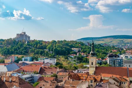 CLUJ-NAPOCA, ROMANIA - August 21, 2018: Cetatuia Park and the Franciscan Church viewed from St. Michael's Church in Cluj-Napoca, Romania.のeditorial素材