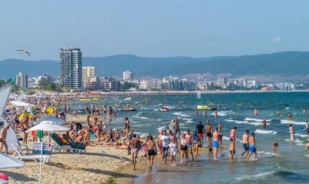 SUNNY BEACH, BULGARIA - 2 SEP 2018: People in the sea at Sunny Beach resort on a sunny day in Bulgaria s Black Sea coast known for its water sports, sand dunes, and nightlife.のeditorial素材