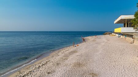 Nessebar, Bulgaria - 7 Sep 2018: Tourists on a beautiful beach in Nesebar ancient city on a sunny day with blue sky. Nessebar, Nesebar or Nesebr is a UNESCO World Heritage Site.のeditorial素材