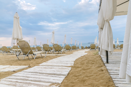 Chairs and umbrellas on a beautiful beach at Sunny Beach on the Black Sea coast of Bulgaria.の写真素材