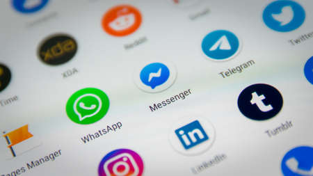 CLUJ, ROMANIA - NOV 06, 2019: Facebook messenger closeup on a smartphone screen settings menu. Facebook messenger illustrative editorial.のeditorial素材