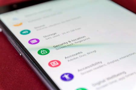 CLUJ, ROMANIA - JUL 17, 2019: Security & location in the Android 9 settings menu. Security & location illustrative editorial.のeditorial素材