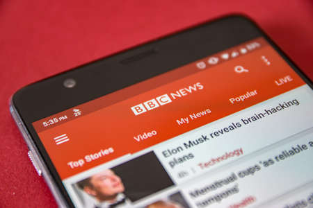 CLUJ, ROMANIA - JUL 17, 2019: BBC application running on an Android device. BBC app illustrative editorial. BBC breaking news.のeditorial素材