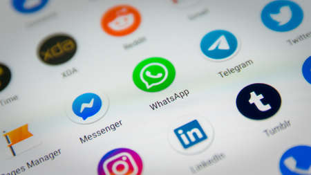 CLUJ, ROMANIA - NOV 06, 2019: Whatsapp icon closeup on a smartphone screen settings menu. Whatsapp illustrative editorial.のeditorial素材