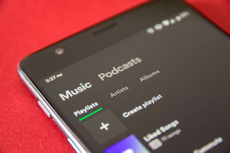 CLUJ, ROMANIA - JUL 17, 2019: Spotify application running on an Android device. Spotify app illustrative editorial. Spotify Music.のeditorial素材