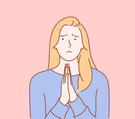 Pathetic expressions, forgiveness emotions concept. Young blonde female look holding palms pressed together, asking for forgiveness, feeling sorry.のイラスト素材