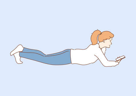 Communication, comfort, smart. Young smiling attractive girl using a smartphone writes or speaks at home after school.のイラスト素材