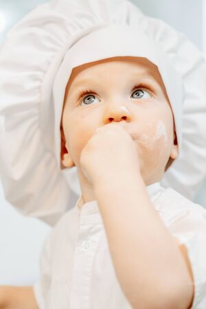 Portrait of a charming little two-year-old boyの写真素材