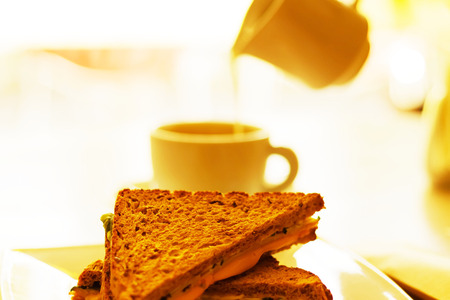 coffee cup and toast with cheeseの写真素材