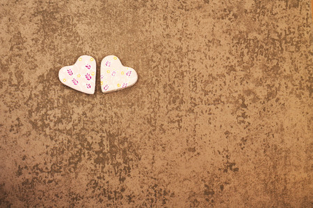 St. Valentines Day two rosy hearts on gray background