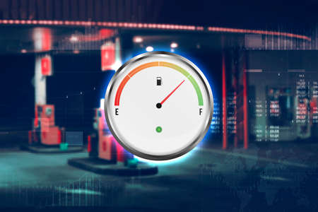 Gas station with fuel gauge. at night. The car is fueled with gasoline. Blurred photo for backgroundの写真素材