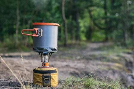 Tourist stove gas for camping and recreation on the background of natureの写真素材