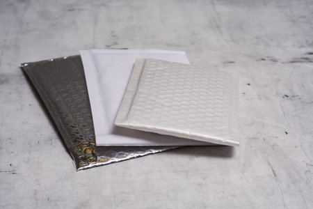 Mailing envelopes with bubbles for safe transportation. Lightweight and durable envelopes for efficient transportationの写真素材