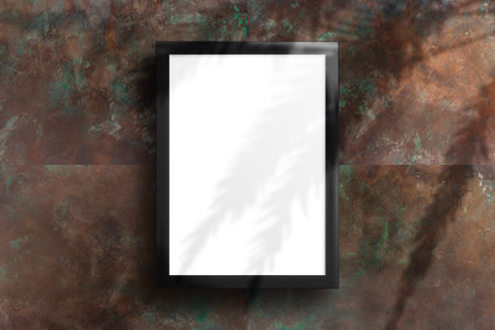 Mockup vertical poster with blank paper close up with a black frame on a stylish marble wall....