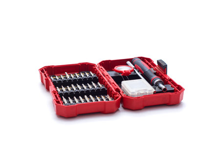 Professional red screwdriver set with bits for repair and assembly tasksの写真素材