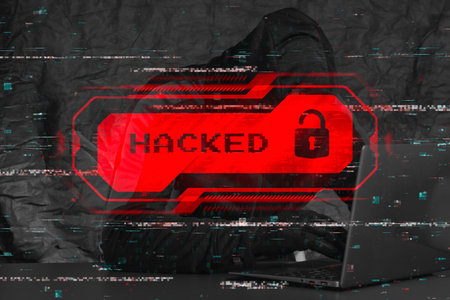 Hooded hacker at a laptop with a red glowing HACKED warning and a digital lock icon. Binary code...