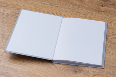 Realistic mockup of book cover, magazine on the wooden background. Concept for demonstrating...