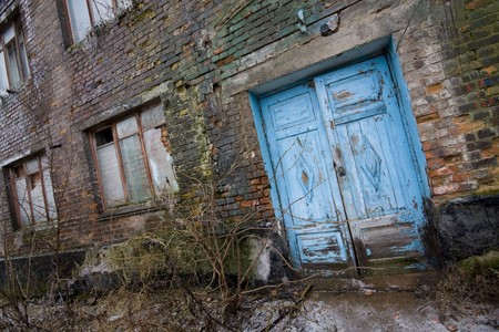 Wall of abandoned factory as a backgroundの写真素材