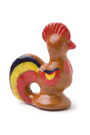 A little  clay sculpture of a cock isolated on white backgroundの写真素材