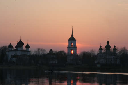 Abandoned country church in the village, sunsetの写真素材