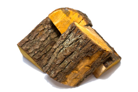Pile of firewood isolated on a white backgroundの写真素材