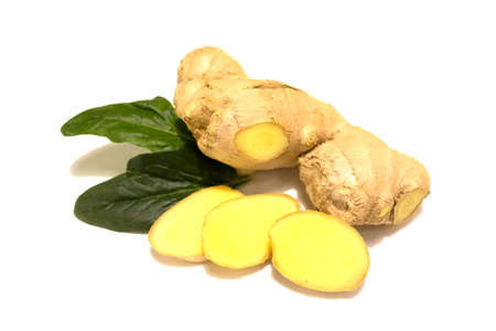 Fresh ginger rhizome with ginger slices and fresh green mint leaves. Isolated on white background.の写真素材
